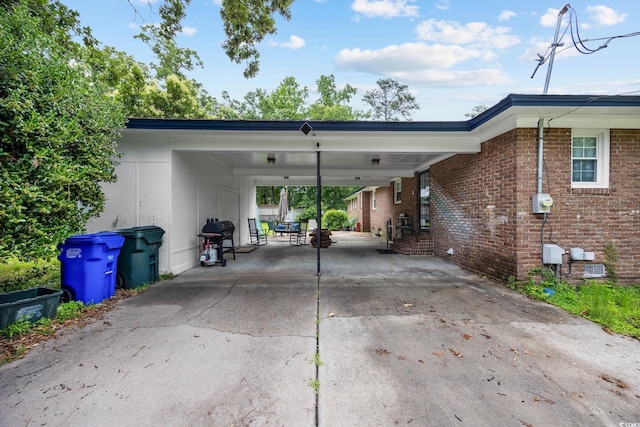 300 Crescent Dr, Conway, SC 29526 - view of side of home featuring a carport, concrete driveway, and brick siding