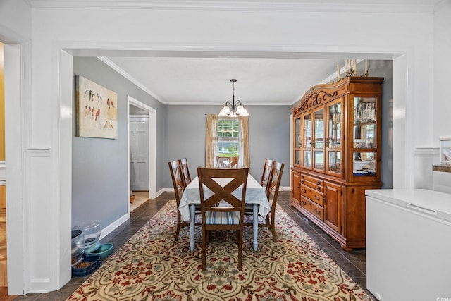 300 Crescent Dr, Conway, SC 29526 - dining space featuring a chandelier, crown molding, and dark tile patterned floors