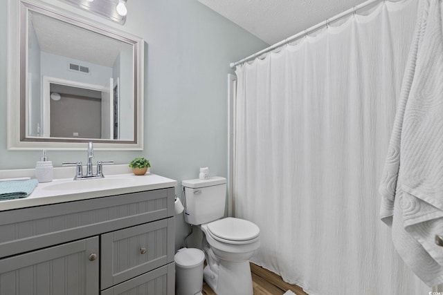 615 Carter Ln Unit D6, Conway, SC 29526 - full bathroom with vanity, wood finished floors, and a textured ceiling