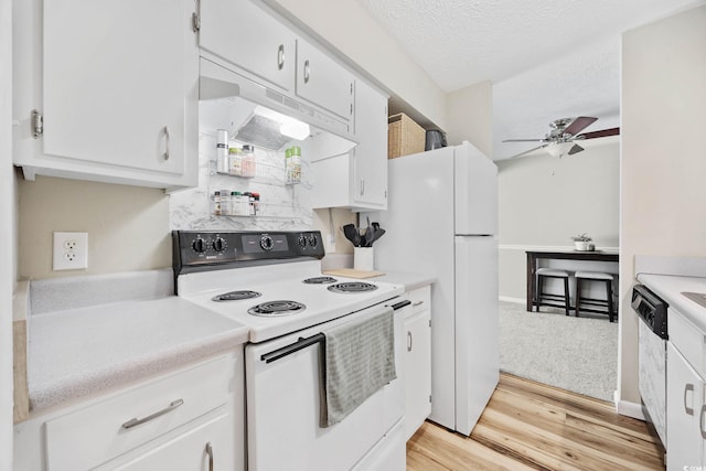 615 Carter Ln Unit D6, Conway, SC 29526 - kitchen featuring electric range, under cabinet range hood, light countertops, a ceiling fan, and light wood finished floors
