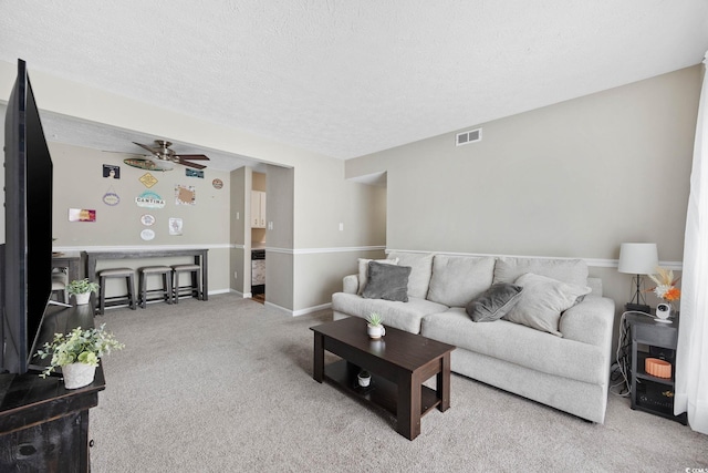615 Carter Ln Unit D6, Conway, SC 29526 - carpeted living area with a ceiling fan and a textured ceiling