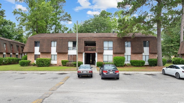 615 Carter Ln Unit D6, Conway, SC 29526 - view of building exterior featuring uncovered parking