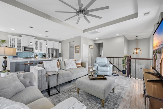 305 Splendor Cir, Murrells Inlet, SC 29576 - living area featuring light wood finished floors, a ceiling fan, a chandelier, and recessed lighting