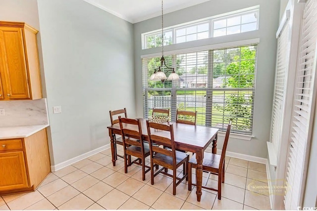 4499 Firethorne Dr, Murrells Inlet, SC 29576 - dining room featuring a chandelier, healthy amount of natural light, light tile patterned flooring, and crown molding