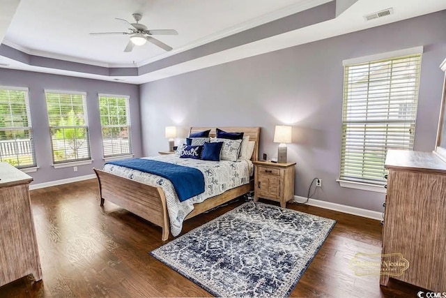 4499 Firethorne Dr, Murrells Inlet, SC 29576 - bedroom with a raised ceiling, crown molding, dark wood-style floors, and ceiling fan