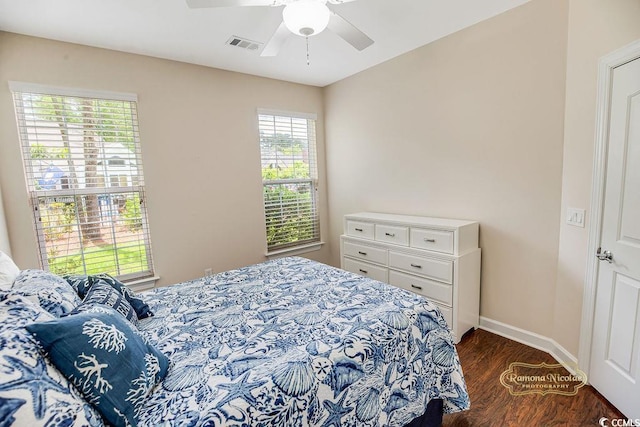4499 Firethorne Dr, Murrells Inlet, SC 29576 - bedroom with dark wood finished floors and a ceiling fan