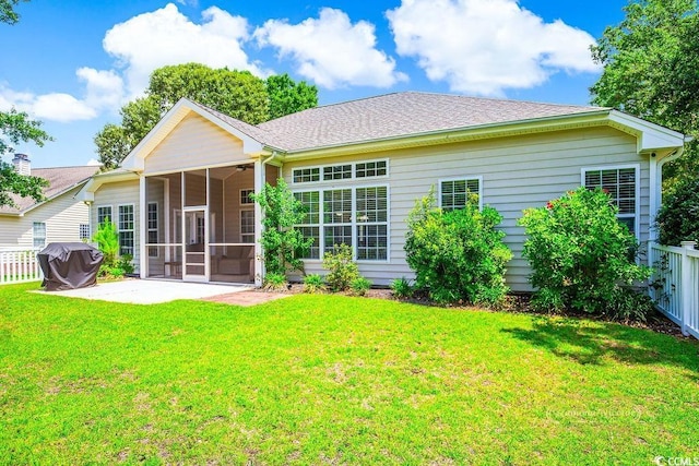 4499 Firethorne Dr, Murrells Inlet, SC 29576 - rear view of house with a sunroom, a patio area, and roof with shingles
