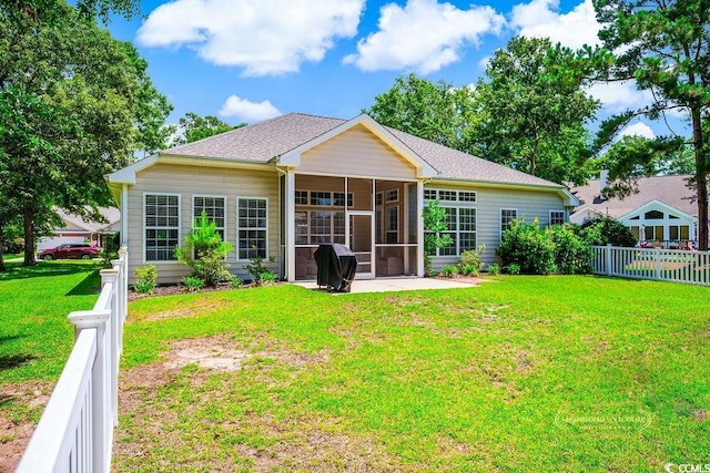4499 Firethorne Dr, Murrells Inlet, SC 29576 - back of property featuring a sunroom and a shingled roof
