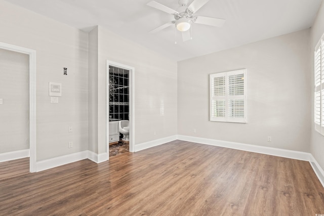 3597 Sunfish St, Murrells Inlet, SC 29576 - empty room featuring wood finished floors, ceiling fan, and a desk