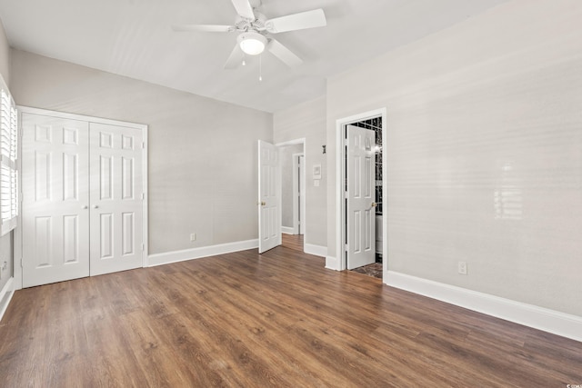 3597 Sunfish St, Murrells Inlet, SC 29576 - unfurnished bedroom with a closet, dark wood-style floors, and a ceiling fan