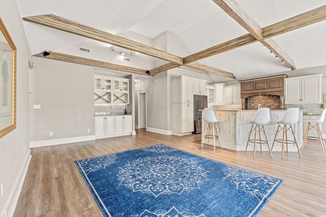 3597 Sunfish St, Murrells Inlet, SC 29576 - living room featuring light wood finished floors and rail lighting