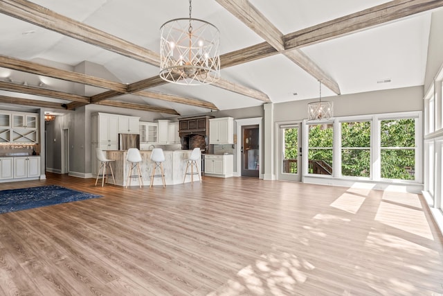 3597 Sunfish St, Murrells Inlet, SC 29576 - unfurnished living room featuring a chandelier and light wood finished floors