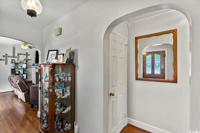 1008 N Withlacoochee Ave, Marion, SC 29571 - hallway featuring arched walkways and wood finished floors