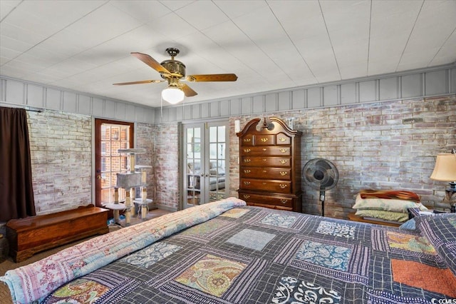 1008 N Withlacoochee Ave, Marion, SC 29571 - bedroom with a ceiling fan and brick wall