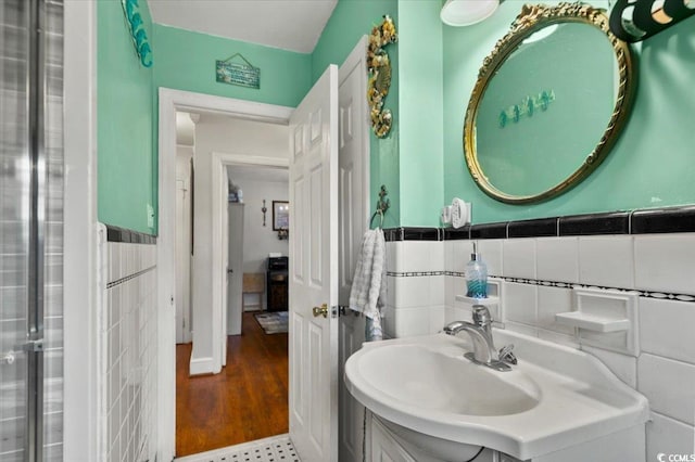 1008 N Withlacoochee Ave, Marion, SC 29571 - bathroom with tile walls, vanity, and wainscoting