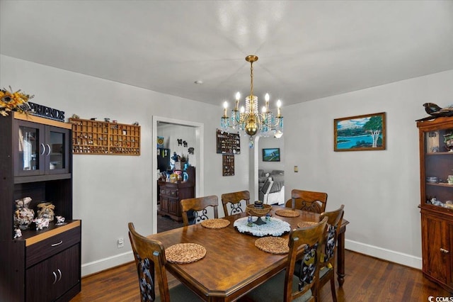 1008 N Withlacoochee Ave, Marion, SC 29571 - dining area with a chandelier and dark wood-type flooring