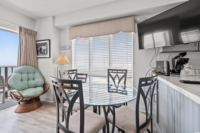 1605 S Ocean Blvd Unit 1403, Myrtle Beach, SC 29577 - dining area featuring wood finished floors and baseboards