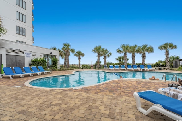 1605 S Ocean Blvd Unit 1403, Myrtle Beach, SC 29577 - community pool with a patio