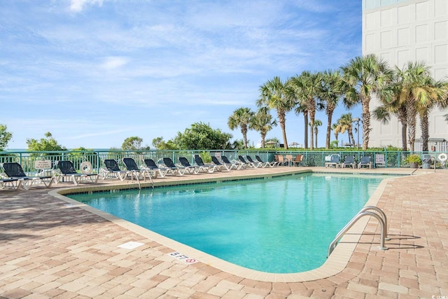 2207 S Ocean Blvd Unit 718, Myrtle Beach, SC 29577 - community pool featuring a patio