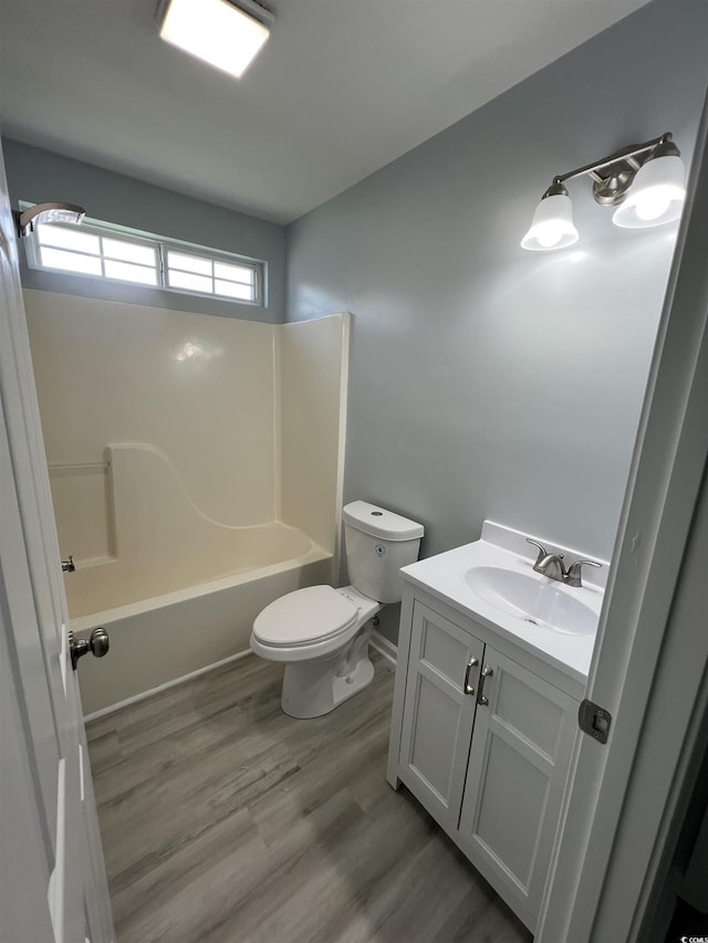 9888 Conifer Ln, Murrells Inlet, SC 29576 - full bathroom with vanity, shower / tub combination, and wood finished floors