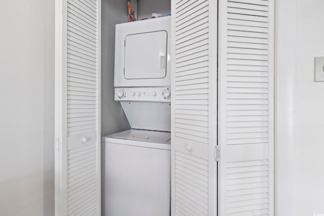 500 Fairway Village Dr Unit J-7, Myrtle Beach, SC 29588 - laundry room featuring estacked washer and dryer