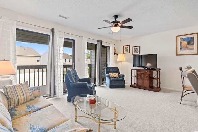 500 Fairway Village Dr Unit J-7, Myrtle Beach, SC 29588 - carpeted living area with ceiling fan and a textured ceiling