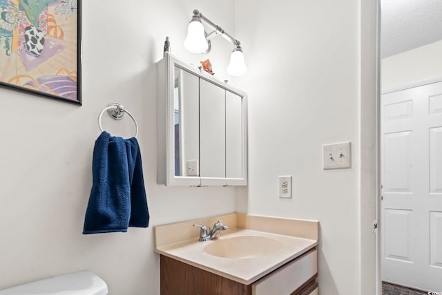 500 Fairway Village Dr Unit J-7, Myrtle Beach, SC 29588 - half bathroom featuring vanity and toilet