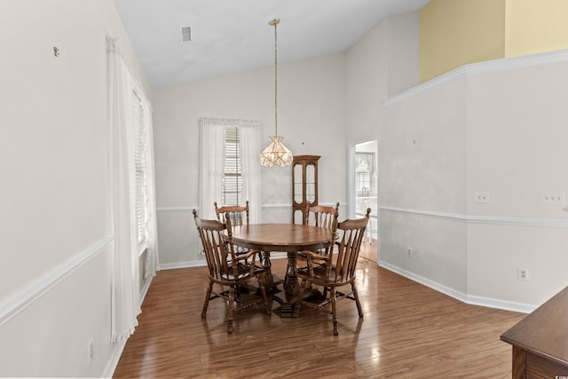 583 Wildflower Trl, Myrtle Beach, SC 29579 - dining room with wood finished floors and high vaulted ceiling