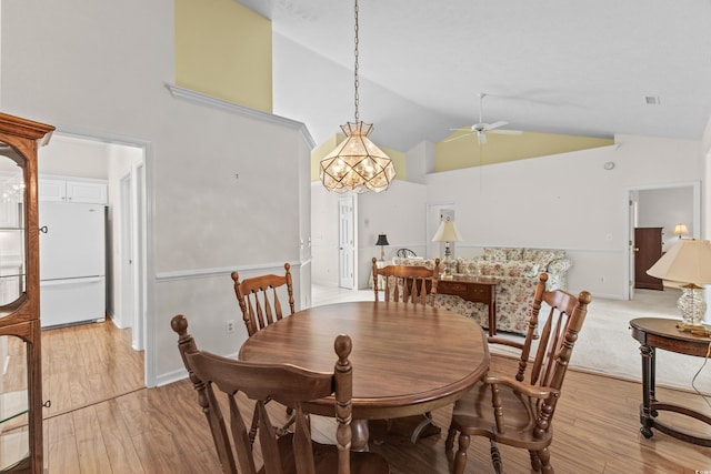 583 Wildflower Trl, Myrtle Beach, SC 29579 - dining room with high vaulted ceiling, ceiling fan, and light wood finished floors