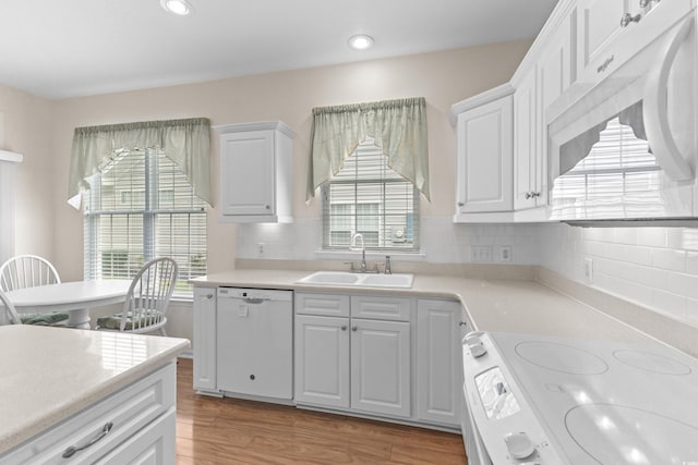 583 Wildflower Trl, Myrtle Beach, SC 29579 - kitchen with white appliances, plenty of natural light, light countertops, white cabinets, and recessed lighting