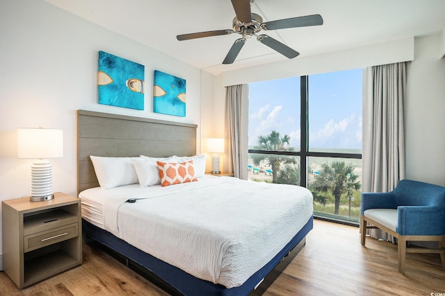 3000 N Ocean Blvd Unit 209, Myrtle Beach, SC 29577 - bedroom featuring wood finished floors and ceiling fan