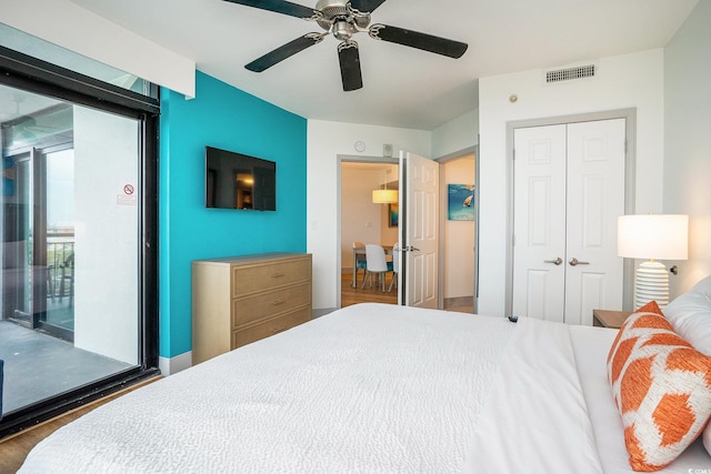 3000 N Ocean Blvd Unit 209, Myrtle Beach, SC 29577 - bedroom with a closet, access to outside, a ceiling fan, and wood finished floors