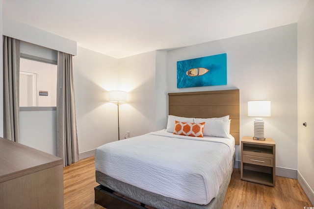 3000 N Ocean Blvd Unit 209, Myrtle Beach, SC 29577 - bedroom featuring wood finished floors