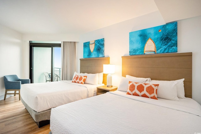 3000 N Ocean Blvd Unit 209, Myrtle Beach, SC 29577 - bedroom with wood finished floors and access to outside