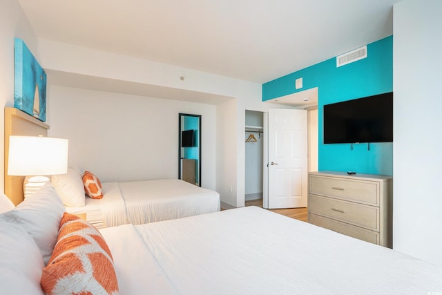 3000 N Ocean Blvd Unit 209, Myrtle Beach, SC 29577 - bedroom featuring a closet and wood finished floors