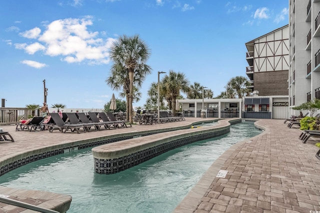 3000 N Ocean Blvd Unit 209, Myrtle Beach, SC 29577 - community pool with a patio area