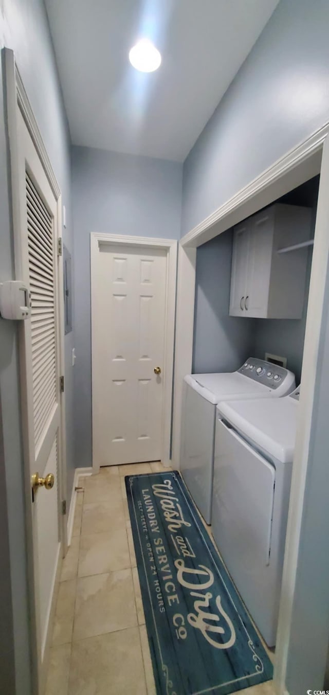 503 20th Ave N Unit 3B, North Myrtle Beach, SC 29582 - washroom with cabinet space and washer and dryer
