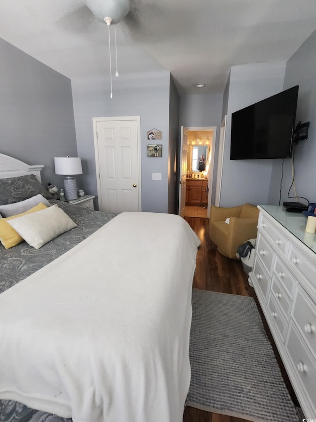503 20th Ave N Unit 3B, North Myrtle Beach, SC 29582 - bedroom with dark wood finished floors