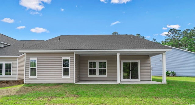 9728 Indigo Creek Blvd, Murrells Inlet, SC 29576 - back of property featuring a patio, a yard, and a shingled roof