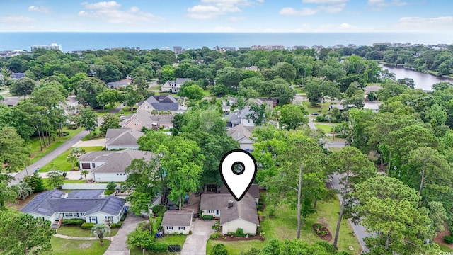 520 13th Ave N, Surfside Beach, SC 29575 - aerial perspective of suburban area with a large body of water and a tree filled landscape