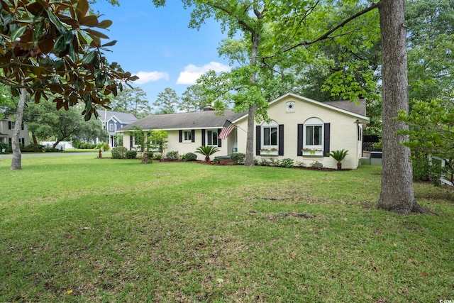 520 13th Ave N, Surfside Beach, SC 29575 - ranch-style home featuring a front yard and a chimney