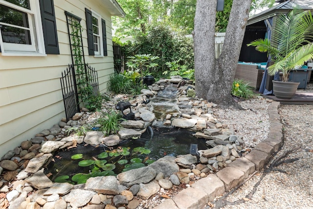 520 13th Ave N, Surfside Beach, SC 29575 - view of yard featuring a garden pond