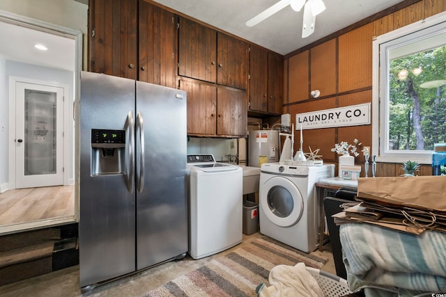 520 13th Ave N, Surfside Beach, SC 29575 - laundry room featuring cabinet space, washing machine and clothes dryer, electric water heater, and a ceiling fan