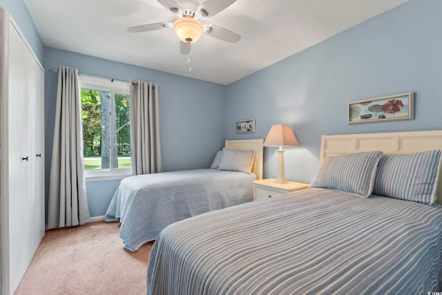 520 13th Ave N, Surfside Beach, SC 29575 - bedroom featuring light carpet, a closet, and ceiling fan