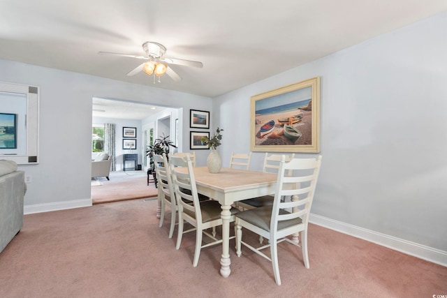 520 13th Ave N, Surfside Beach, SC 29575 - dining room with carpet and a ceiling fan