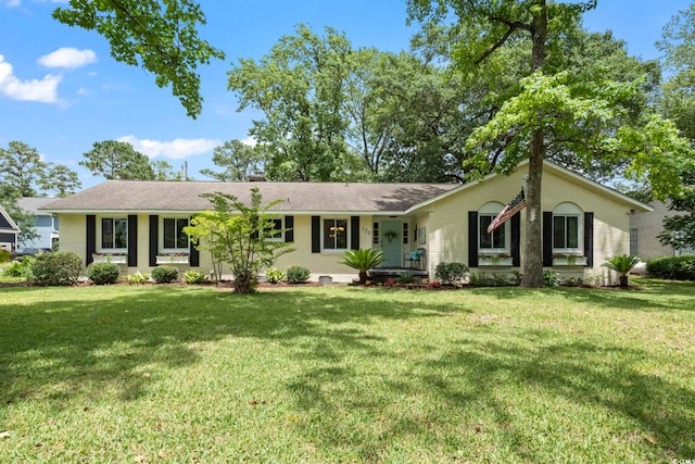 520 13th Ave N, Surfside Beach, SC 29575 - ranch-style home featuring a front yard and brick siding