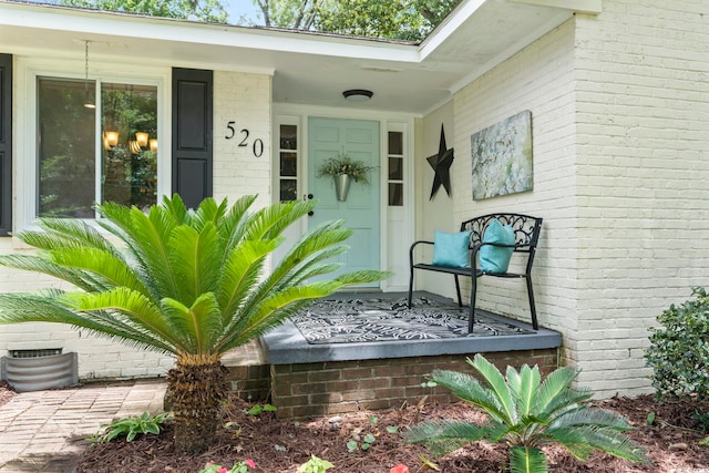 520 13th Ave N, Surfside Beach, SC 29575 - property entrance with brick siding and a porch