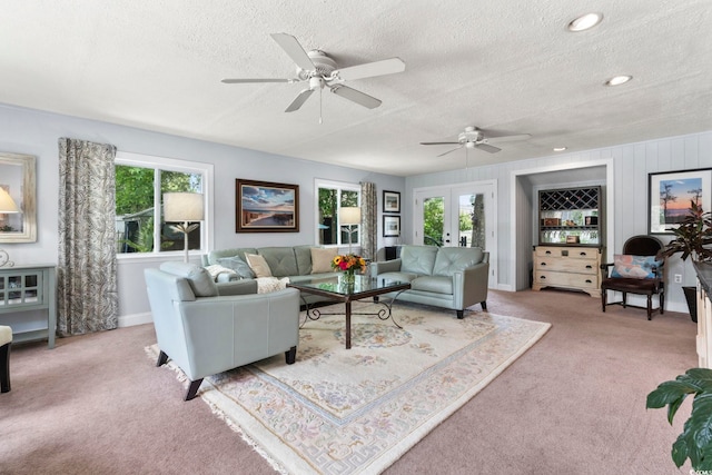 520 13th Ave N, Surfside Beach, SC 29575 - living area featuring a textured ceiling, light colored carpet, ceiling fan, french doors, and recessed lighting