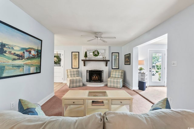 520 13th Ave N, Surfside Beach, SC 29575 - carpeted living area featuring ceiling fan and a brick fireplace