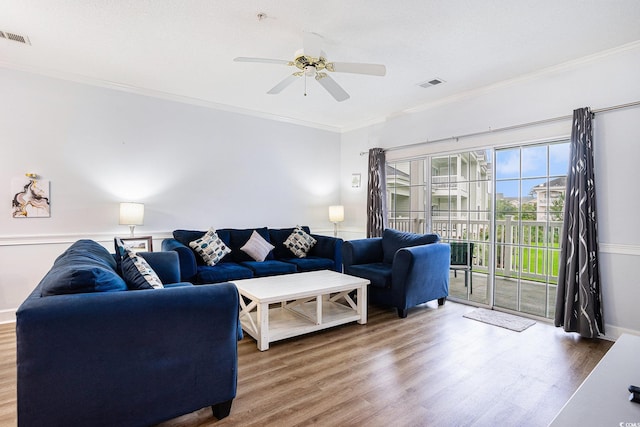 4868 Dahlia Ct Unit 202, Myrtle Beach, SC 29577 - living area with wood finished floors, crown molding, and ceiling fan